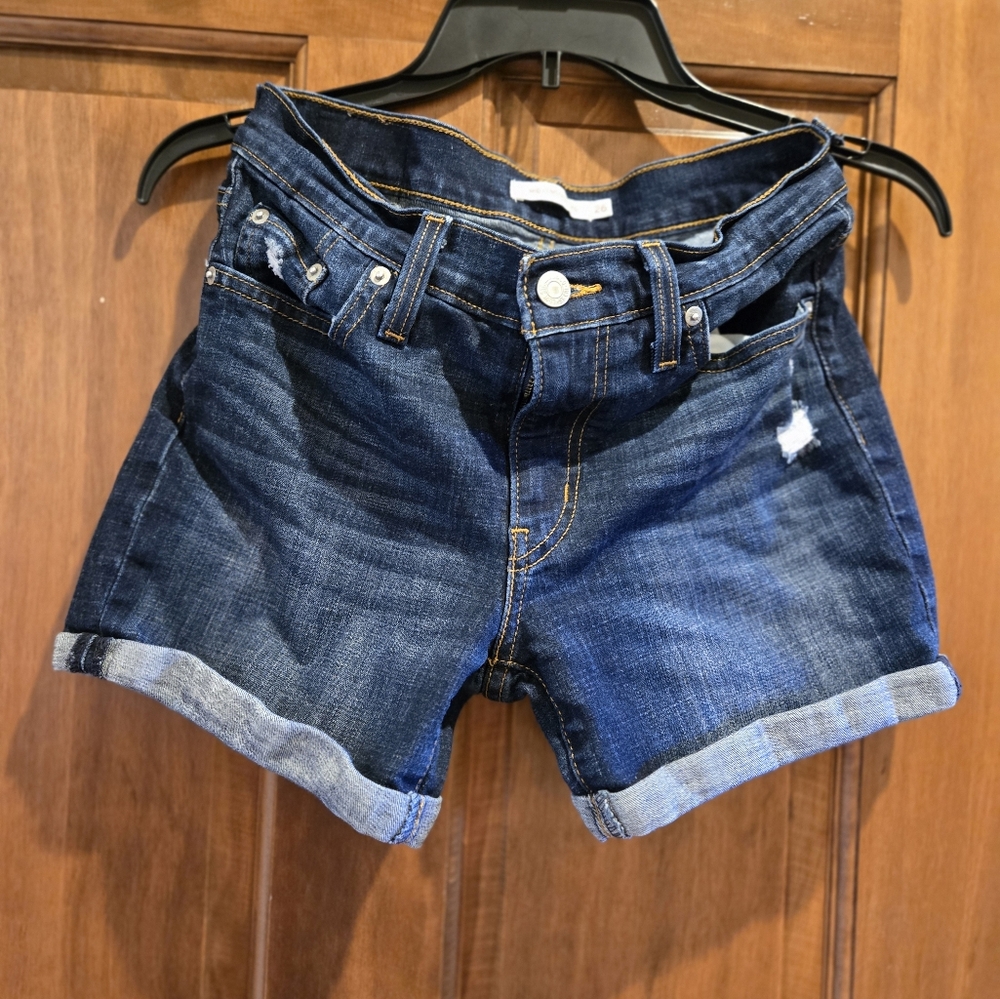 Slightly Distressed Womens Levi Dark wash shorts
